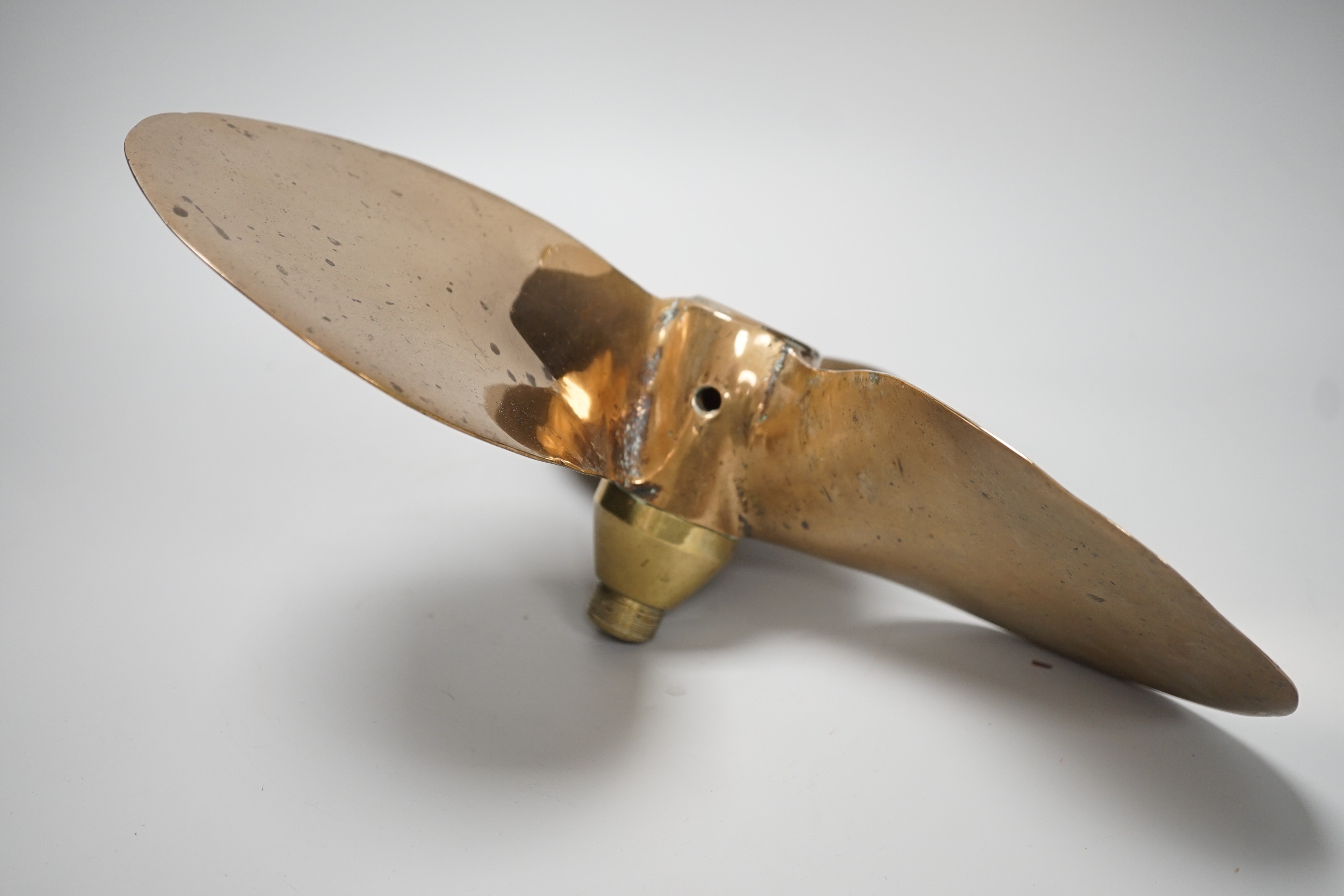 A lifeboat bronze propeller. 35cm diameter approx. salvaged from Chittagong ship yard between 1984-1989